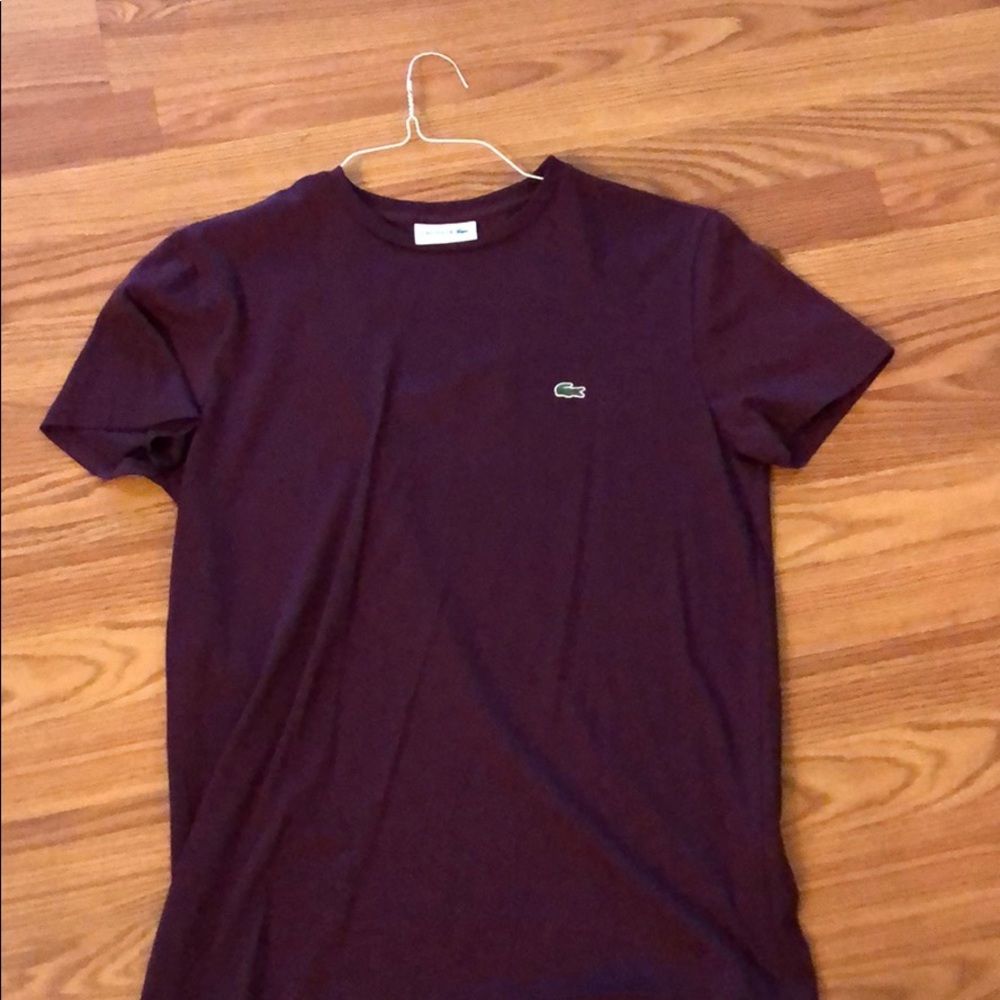This is a medium size Lacoste shirt.